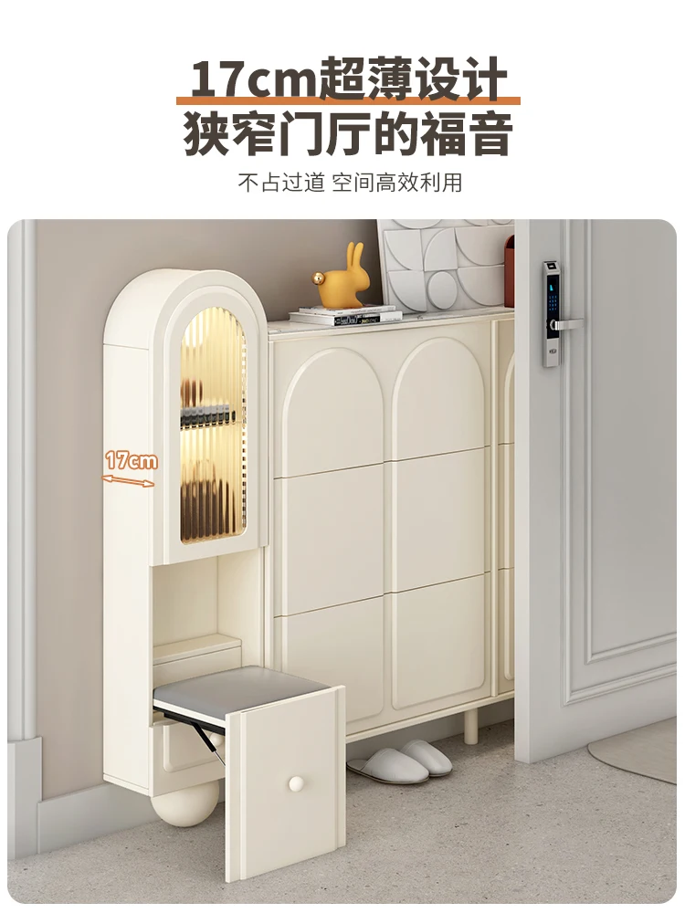 French ultra-thin shoe cabinet with door strap and shoe changing stool integrated against the wall
French ultra-thin shoe cabinet with door strap and shoe changing stool integrated against the wall