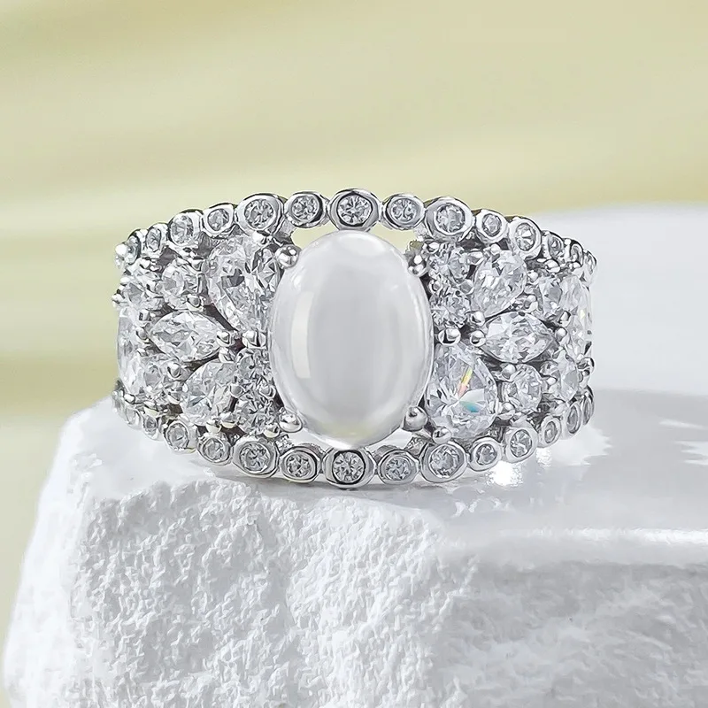 

Light Luxury Instagram Style Pure Silver Hollow Water Foam Jade 6 * 8 Ring Ring with New Chinese Egg Face Diamonds