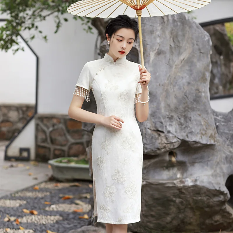 Elegant Mandarin Collar Embroidery Chiffon Qipao Short Sleeve Beaded Tassel Cheongsam Retro Chinese Women Dress
Elegant Mandarin Collar Embroidery Chiffon Qipao Short Sleeve Beaded Tassel Cheongsam Retro Chinese Women Dress