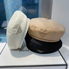2022 European and American solid color triangle label ladies beret spring and summer fashion travel octagonal painter hat 
2022 European and American solid color triangle label ladies beret spring and summer fashion travel octagonal painter hat
