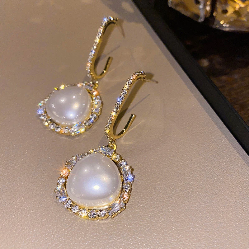 New Micro-encrusted Zircon Pearl Pendant Stud Earrings for Women Fashion Exquisite Light Luxury Sweet Cool Girls Party Jewelry
New Micro-encrusted Zircon Pearl Pendant Stud Earrings for Women Fashion Exquisite Light Luxury Sweet Cool Girls Party Jewelry