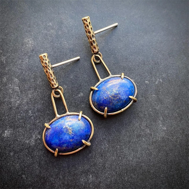 Ethnic Oval Inlaid with Blue Stones Dangle Earrings Vintage Personality Metal Geometry Carving Pattern Drop Earrings Jewelry
Ethnic Oval Inlaid with Blue Stones Dangle Earrings Vintage Personality Metal Geometry Carving Pattern Drop Earrings Jewelry