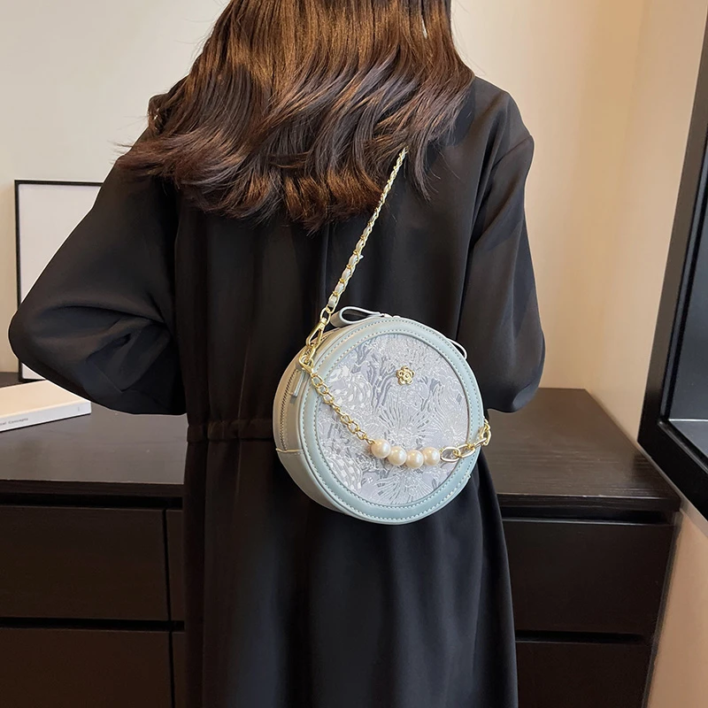 Мода Новый Свежий Сладкий Перламутр Цепь Одно Плечо Crossbody Сумки Простой Досуг Сто Темперамент Commuter Маленькие Круглые Сумки
Мода Новый Свежий Сладкий Перламутр Цепь Одно Плечо Crossbody Сумки Простой Досуг Сто Темперамент Commuter Маленькие Круглые Сумки