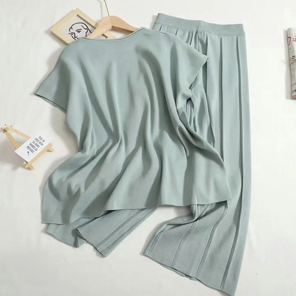 Women Loose Fit Suit Stylish Women's Summer Set Sleeveless Round Neck Top with Wide Leg Pants Irregular Hem Solid Color Elastic
Women Loose Fit Suit Stylish Women's Summer Set Sleeveless Round Neck Top with Wide Leg Pants Irregular Hem Solid Color Elastic
