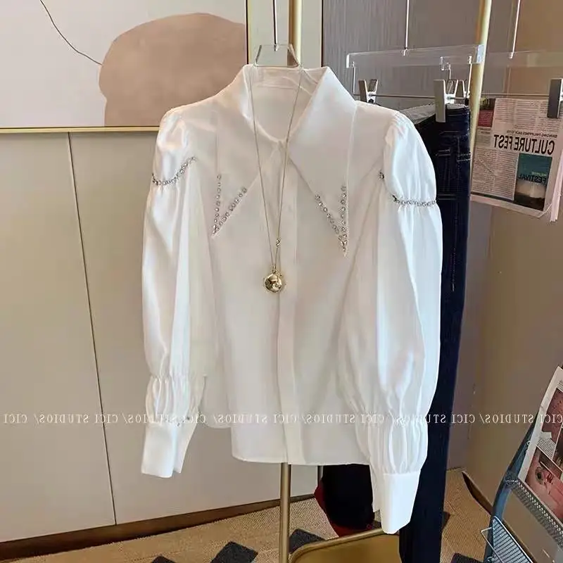 2023 Spring Summer Long Sleeve Blouses Femme Sweet Doll Collar Diamond Shirt New Casual Loose White Top Women's Blusas
2023 Spring Summer Long Sleeve Blouses Femme Sweet Doll Collar Diamond Shirt New Casual Loose White Top Women's Blusas
