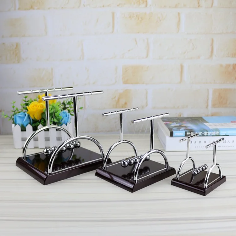T-shaped Newton Cradle Balance Pendulum Ball Energy Conservation Balance Ornament Physics Science Tumbler Craft Desktop Toy Gift
T-shaped Newton Cradle Balance Pendulum Ball Energy Conservation Balance Ornament Physics Science Tumbler Craft Desktop Toy Gift
