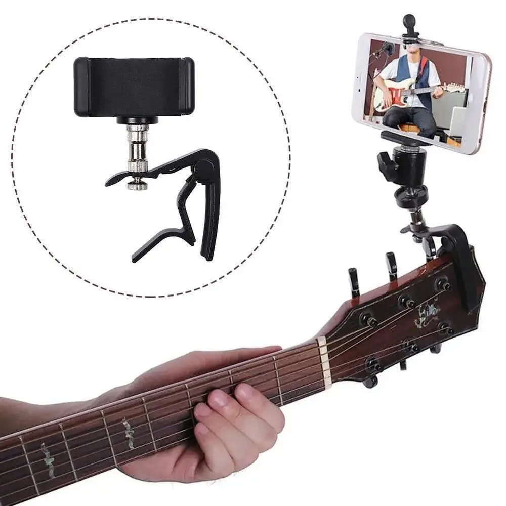Alloy Guitar Neck Phone Holder Guitar Accessories 360° Rotation Guitar Headstock Clamp Clip Plastic Mount Phone Holder Guitar 
Alloy Guitar Neck Phone Holder Guitar Accessories 360° Rotation Guitar Headstock Clamp Clip Plastic Mount Phone Holder Guitar