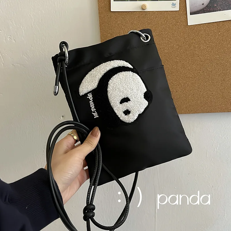2023 New Cute Plush Panda Mobile Phone Bag Embroidered Nylon Cloth Bag Simple Crossbody Shoulder Bag
2023 New Cute Plush Panda Mobile Phone Bag Embroidered Nylon Cloth Bag Simple Crossbody Shoulder Bag