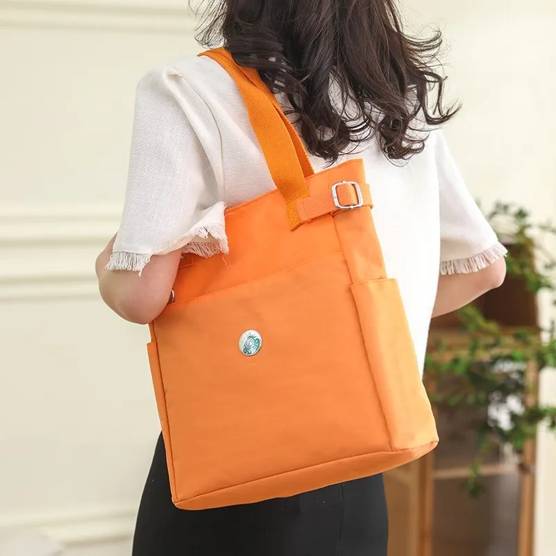 2023 Simple Nylon Tote Bag Solid Color New Women's Casual Large Capacity Shoulder Bag Korean Commuter School Large Canvas Bags
2023 Simple Nylon Tote Bag Solid Color New Women's Casual Large Capacity Shoulder Bag Korean Commuter School Large Canvas Bags