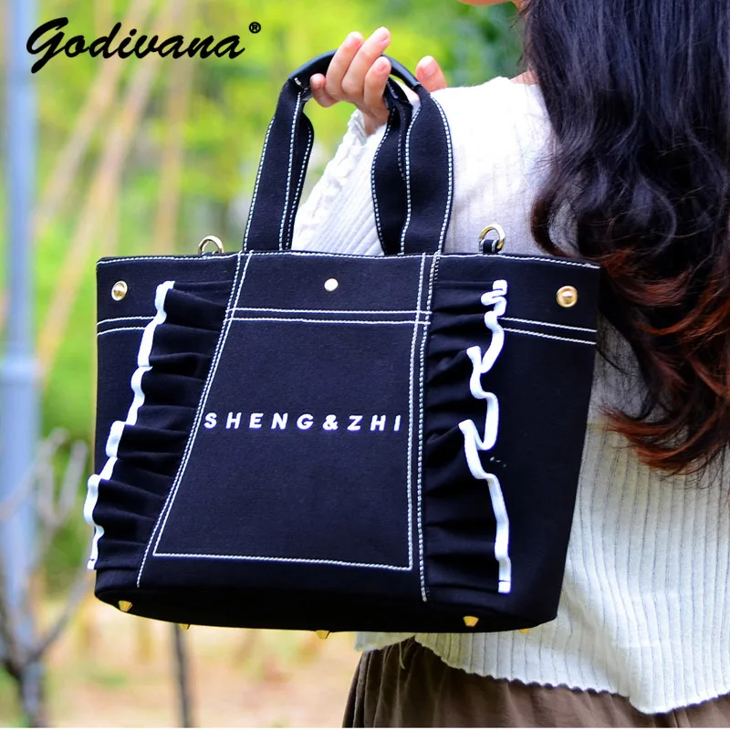 Women's Japanese Style Leisure Large Capacity Canvas Bag Lotus Leaf Fashion Tote Bag Female Shoulder Portable Messenger Bag
Women's Japanese Style Leisure Large Capacity Canvas Bag Lotus Leaf Fashion Tote Bag Female Shoulder Portable Messenger Bag