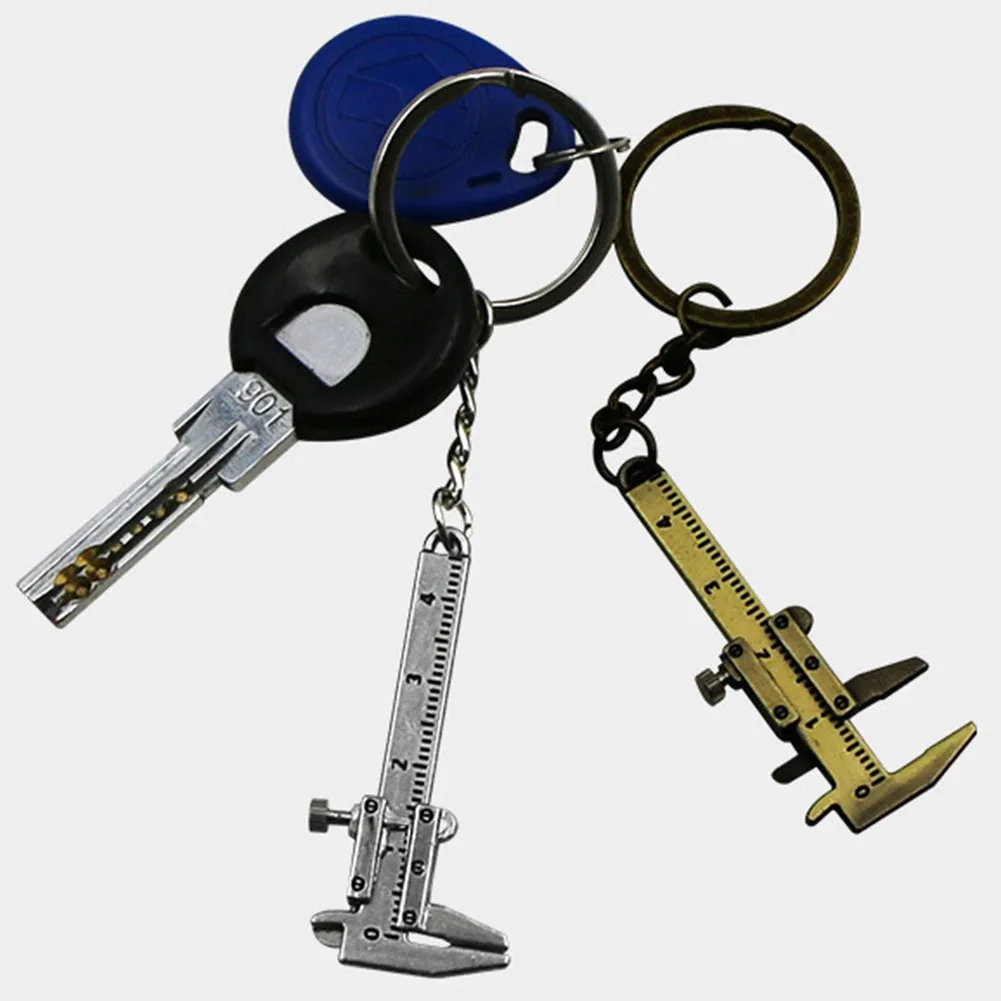 Portable Mini Metal Ruler Vernier Caliper Ruler Key Chain Movable Vernier Caliper Ruler Gauging Model Keychain Creative Gifts
Portable Mini Metal Ruler Vernier Caliper Ruler Key Chain Movable Vernier Caliper Ruler Gauging Model Keychain Creative Gifts