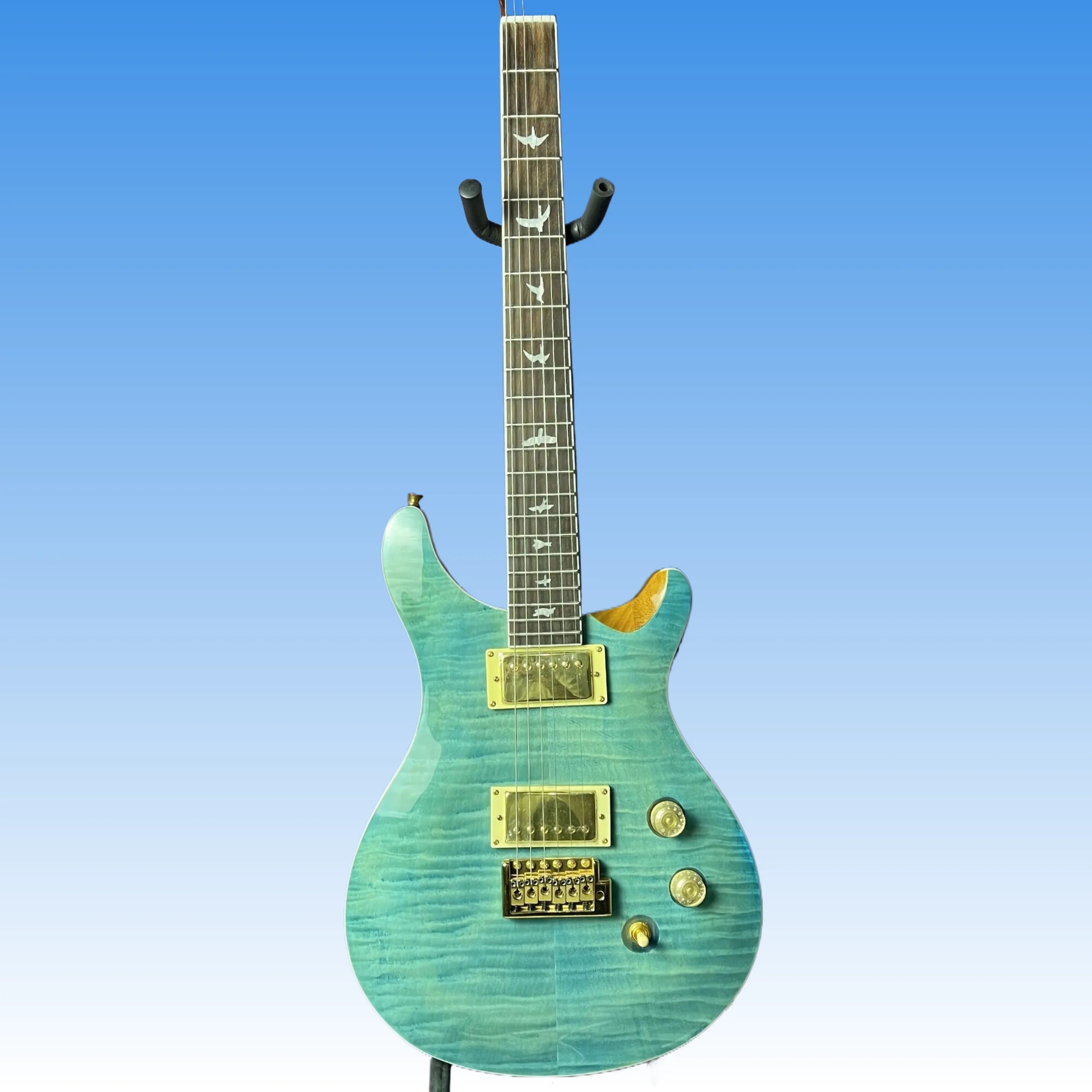 Flame maple top electric guitar, rose wood fingerboard, yellow back, high-quality six string guitar, factory customized
Flame maple top electric guitar, rose wood fingerboard, yellow back, high-quality six string guitar, factory customized