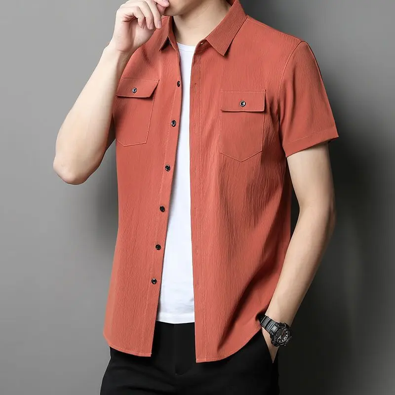 

2023 Summer New Men's Clothing Short Sleeve Trend Handsome Korean Version Solid Color Fashion Casual Spliced Pocket Button Shirt