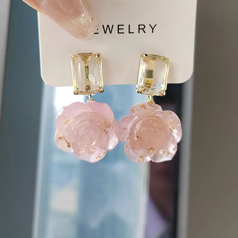 Fashion elegant temperament crystal pink color flower earrings for women design creative personality earring 
Fashion elegant temperament crystal pink color flower earrings for women design creative personality earring