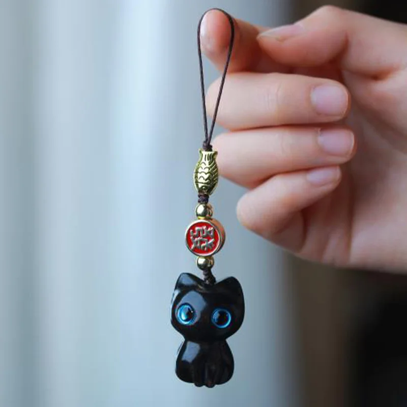 Ebony kitten mobile phone chain cute cat car keychain pendant mobile phone pendant rope chain wood carving small ornament
Ebony kitten mobile phone chain cute cat car keychain pendant mobile phone pendant rope chain wood carving small ornament