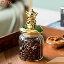 Transparent Statue Glass Storage Jug Golden Ceramic Lid Creative Beautiful Snack Food Grade Candy Kitchen Materials Spices Jar
Transparent Statue Glass Storage Jug Golden Ceramic Lid Creative Beautiful Snack Food Grade Candy Kitchen Materials Spices Jar