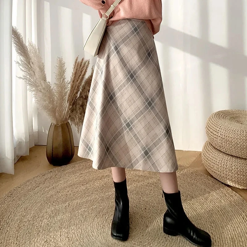 Suitable crotch Thick Legs Tweed Plaid Half-body Women's Autumn Winter Long A-line High-waisted Skinny Knee Umbrella Skirt Retro
Suitable crotch Thick Legs Tweed Plaid Half-body Women's Autumn Winter Long A-line High-waisted Skinny Knee Umbrella Skirt Retro