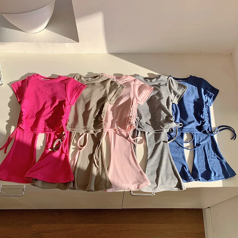 Girls' summer two-piece baby summer short-sleeved drawstring Korean version soft waxy bell-bottom pants two-piece set
Girls' summer two-piece baby summer short-sleeved drawstring Korean version soft waxy bell-bottom pants two-piece set