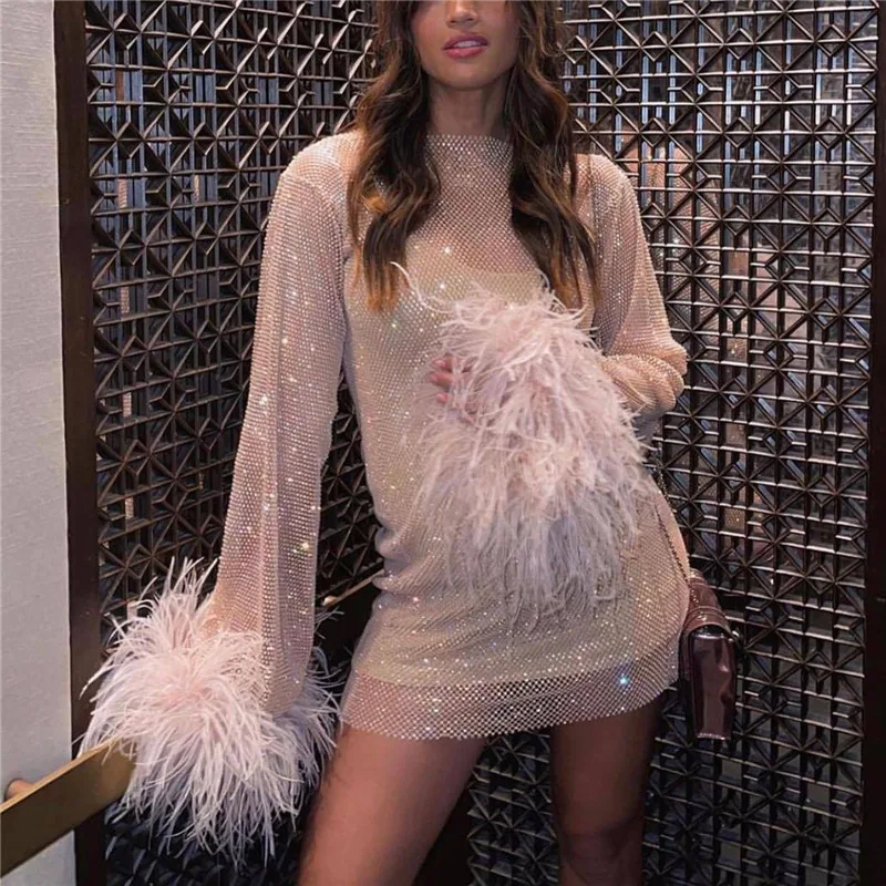 Sexy Bling Mesh Feathers Rhinestone Women Dress Long Sleeves Diamond Fishnet Hollow Out See Through Evening Party Dress
Sexy Bling Mesh Feathers Rhinestone Women Dress Long Sleeves Diamond Fishnet Hollow Out See Through Evening Party Dress