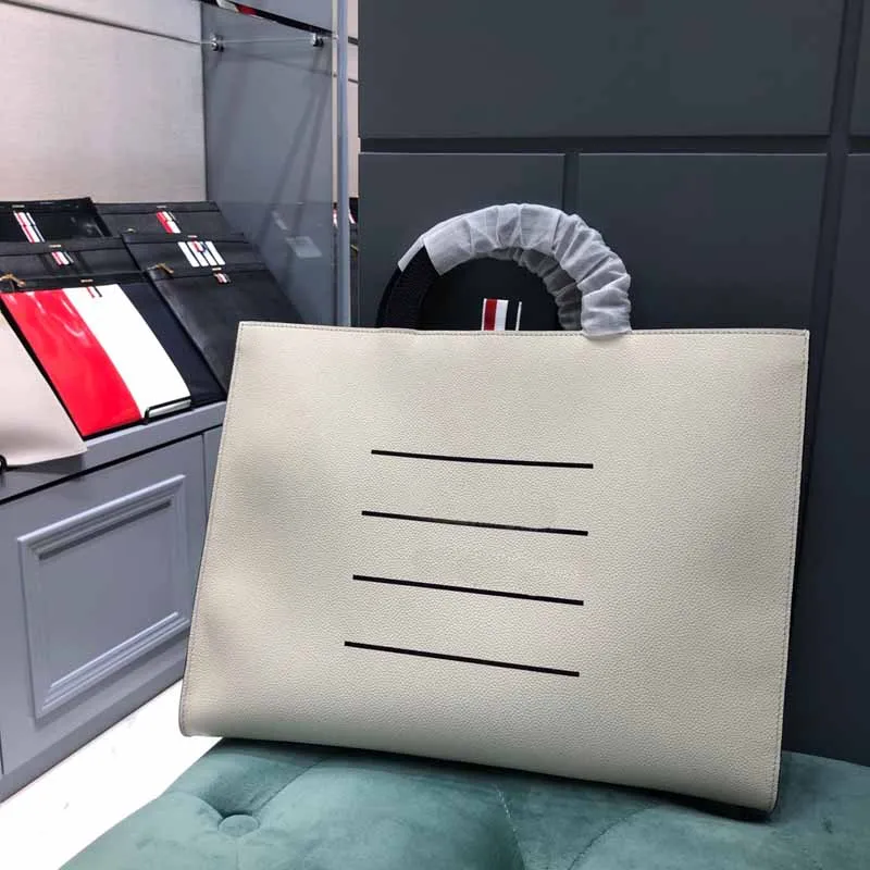 T Briefcases Luxury Brand Fashion Style Black White Leather Tote Large Capacity High Quality Office Handbags
T Briefcases Luxury Brand Fashion Style Black White Leather Tote Large Capacity High Quality Office Handbags