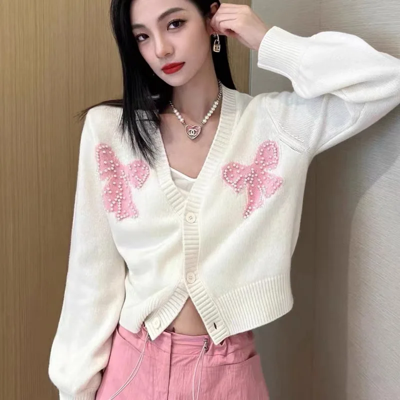 Beading Bow Pink Sweater Short Coat Single-breasted Knitted Cardigans Women Autumn Winter Long Sleeve cropped cardigan Jumper
Beading Bow Pink Sweater Short Coat Single-breasted Knitted Cardigans Women Autumn Winter Long Sleeve cropped cardigan Jumper