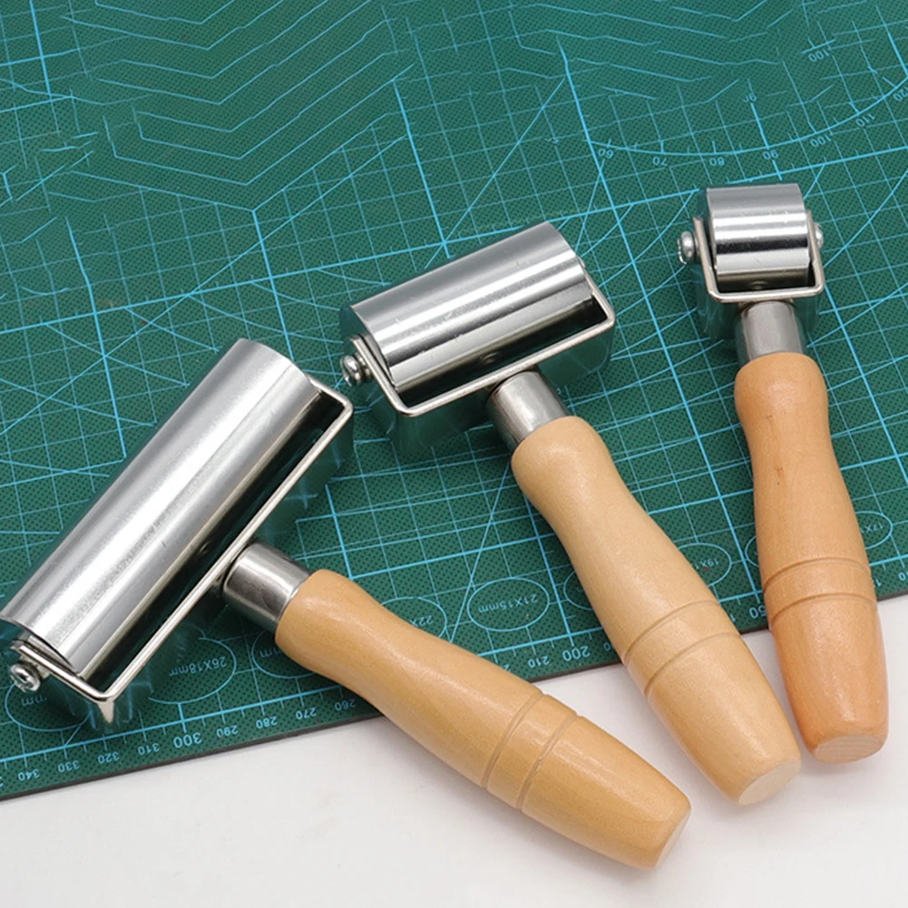 Solid Hand Push Roller Leather Edge Press With Wooden Handle Flattened Leather Light Weight Easy To Hold
Solid Hand Push Roller Leather Edge Press With Wooden Handle Flattened Leather Light Weight Easy To Hold