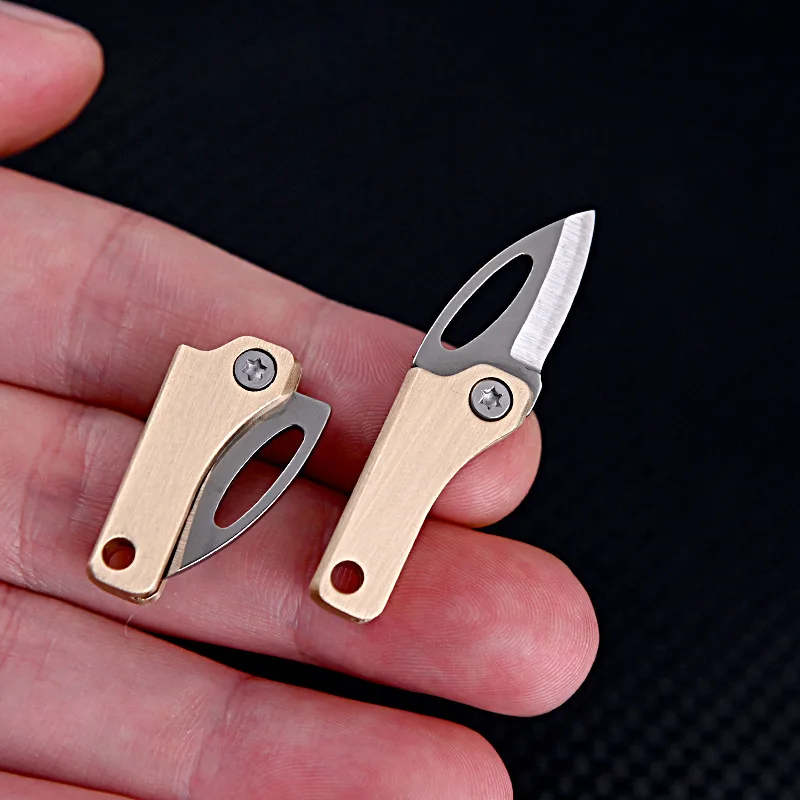 Mini Brass Folding Knife Sharp Self-Defense Portable Keychain Hanging Outdoor Unboxing Knife Multi Pocket Knife Cutting Tool
Mini Brass Folding Knife Sharp Self-Defense Portable Keychain Hanging Outdoor Unboxing Knife Multi Pocket Knife Cutting Tool