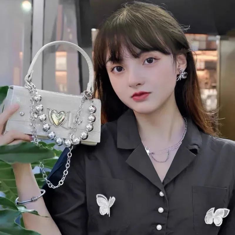 New Crocodile Pattern Love Ball Handheld Women's Bag Sweet and Cool Girl Style Chain One Shoulder Oblique Cross Small Square Bag 
New Crocodile Pattern Love Ball Handheld Women's Bag Sweet and Cool Girl Style Chain One Shoulder Oblique Cross Small Square Bag