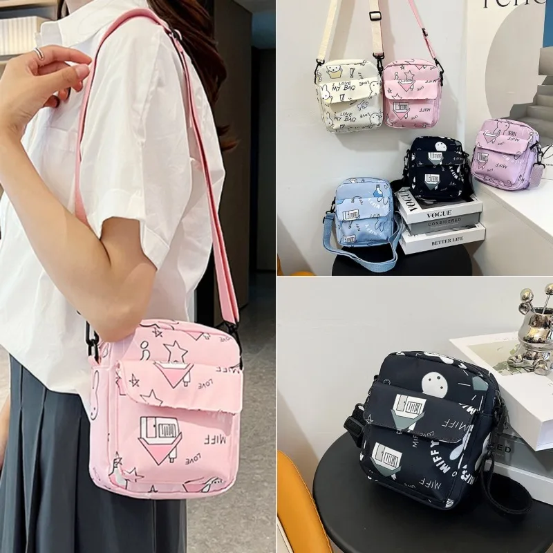 Nylon Shoulder Bag for Girls Cute Cartoon Messenger Bag Fashion Schoolgirl Versatile Phone Wallet Backpack for Women
Nylon Shoulder Bag for Girls Cute Cartoon Messenger Bag Fashion Schoolgirl Versatile Phone Wallet Backpack for Women