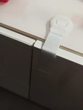 Cerradura de cajón de puerta de armario multifunción para bebé, cinta de seguridad contra la mano, cinturón de tela para niños, protección