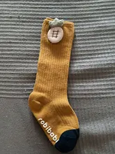 Calcetines antideslizantes hasta la rodilla para niños y niñas, medias largas de algodón con empuñaduras