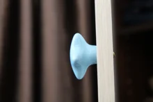 NAIERDI-perilla cerámica para gabinete de habitación de niños, tirador de armario con diseño de dibujos animados, luna y estrella, manijas para puerta de jardín