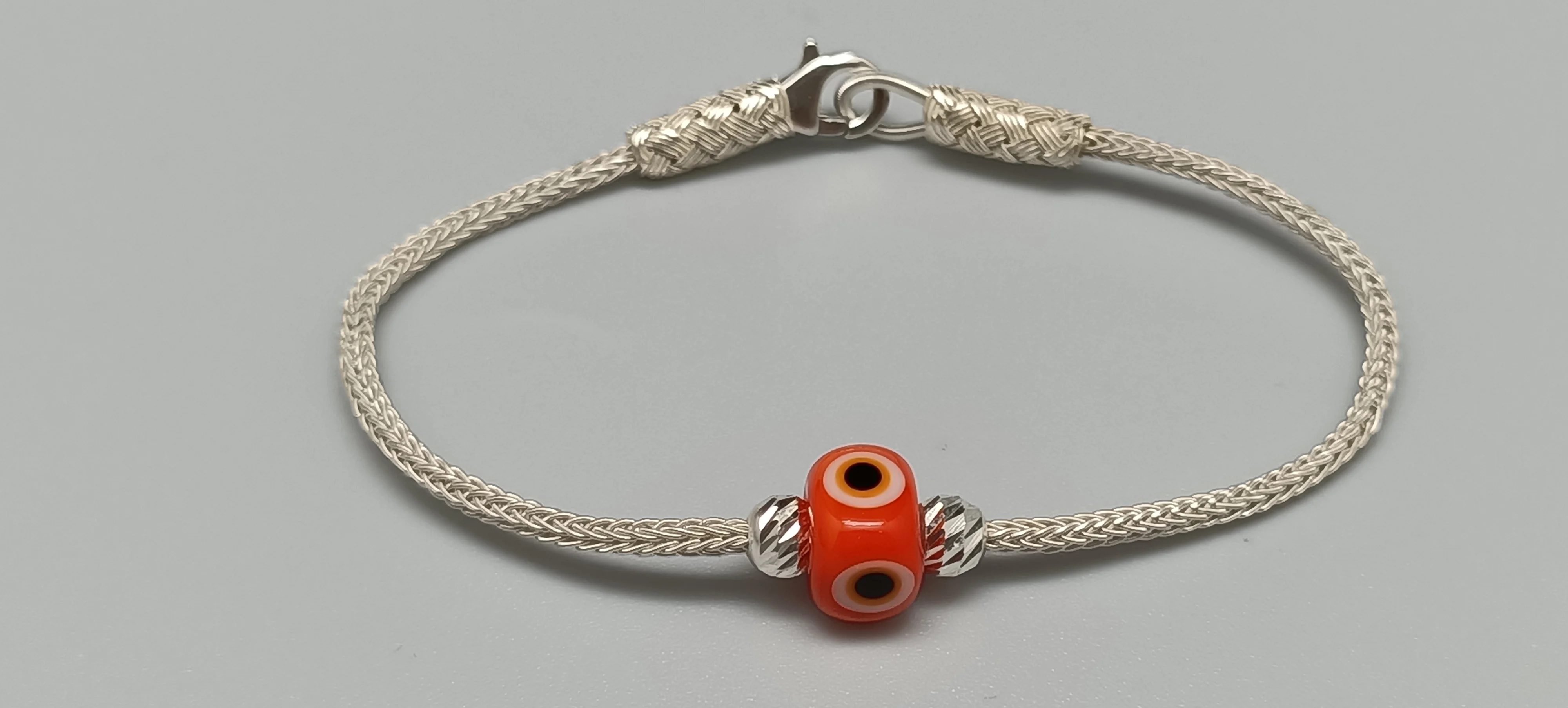 Trabzon Kazaz Wristband (Bracelet) single chain hand-knitted 1000 sterling silver with the Orange Evil Eye bead Great Gift for
Trabzon Kazaz Wristband (Bracelet) single chain hand-knitted 1000 sterling silver with the Orange Evil Eye bead Great Gift for