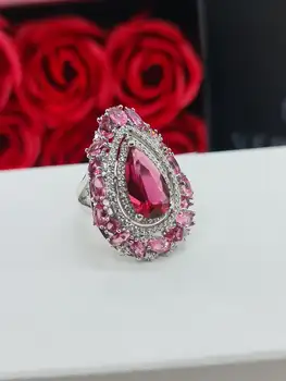 925 silver ring with ruby stone and cubic zirconia 
925 silver ring with ruby stone and cubic zirconia