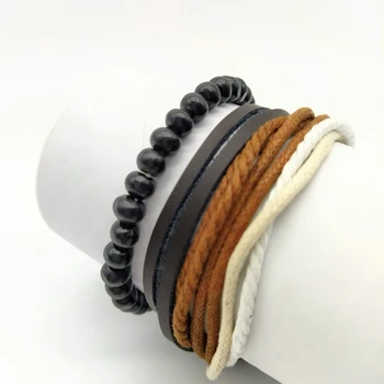 Men's leather and cord bracelets.
Men's leather and cord bracelets.
