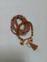 Conjunto de pulseras elásticas multicapa para mujer, joyería Bohemia, brazaletes con borla, moneda de oro, encanto de cuentas de cristal, regalo para mujer