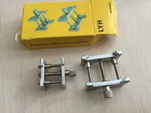 2 unids/set de soporte de Metal para movimiento de reloj, Base fija, multifunción, para relojero, abrazadera de reloj, herramientas de reparación, accesorios