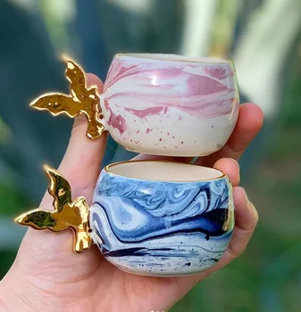 Gold bird cup spirit of ecstasy 24K real gold handle with navy blue and pink colors handmade 
Gold bird cup spirit of ecstasy 24K real gold handle with navy blue and pink colors handmade