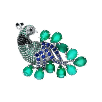 Silver brooch with cubic zirconia and хризолитами synthetic sunlight sample 925
Silver brooch with cubic zirconia and хризолитами synthetic sunlight sample 925