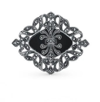 Silver brooch with marcasites and Onyx sunlight sample 925 
Silver brooch with marcasites and Onyx sunlight sample 925