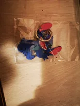 Anime Stitch llavero figura PVC dibujo animado anillo 3D doble lado clave cadena lindo anillo clave titular regalo de mochila Decoración