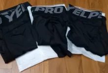 Pantalones cortos deportivos con bolsillos para hombre, shorts ajustados elásticos de secado rápido para entrenamiento de correr y Gimnasio Profesional