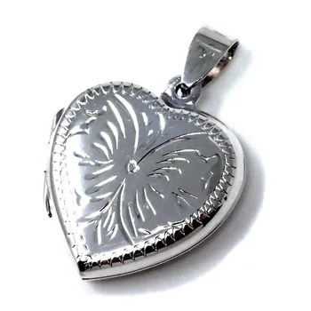 Pendant 925 Sterling silver m locket 24mm. Heart shape smooth carved both sides equal open
Pendant 925 Sterling silver m locket 24mm. Heart shape smooth carved both sides equal open