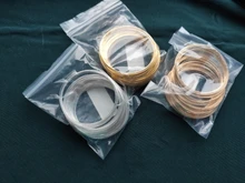 Lote de 100 unidades de cuentas de alambre de acero con memoria de 0,6mm, accesorios para fabricación de pulseras