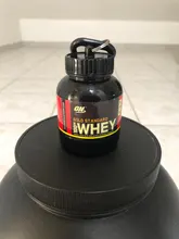 1PC 100ML portátil botella para polvo de proteína con llavero de salud embudo medicina publicidad botella de agua vaso botella para deporte al exterior