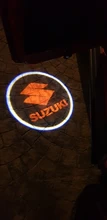 2X Led COCHE Luz de bienvenida para puerta logotipo del proyector lámpara para Suzuki Vitara Jimny Swift Ignis Vitara S Baleno Celerio Kizashi Splash XL7