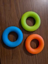 1 Uds 7cm fuerza de agarre de la mano de anillo de entrenamiento de fuerza muscular de goma anillo Fitness cuerpo edificio carpiano expansor de entrenamiento anillo de dedo