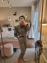 TWOTWINSTYLE Patchwork Ruffle Casual Jumpsuit For Women Stand Collar Long Sleeve High