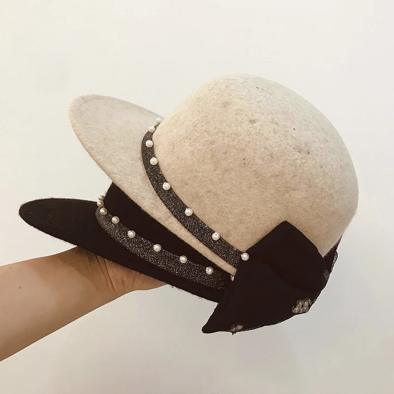 New Fahsion Black Beige Wool Hats for Women Pearl Band Big Bowknot Winter Cap Cute Lady Girl Outdoor Snapback Cap Baseball Cap
New Fahsion Black Beige Wool Hats for Women Pearl Band Big Bowknot Winter Cap Cute Lady Girl Outdoor Snapback Cap Baseball Cap