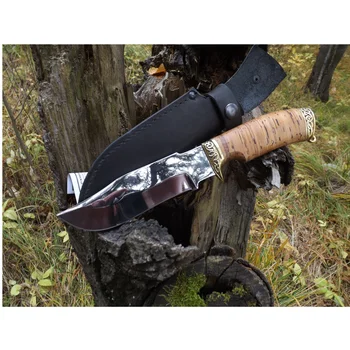 Knife cutting Fang with forged steel blade x12mf with brass and birch bark handle 
Knife cutting Fang with forged steel blade x12mf with brass and birch bark handle